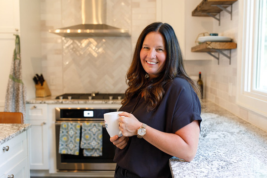 woman standing in kitchen